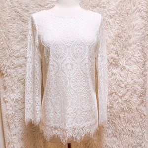 Intricate white lace long sleeve top